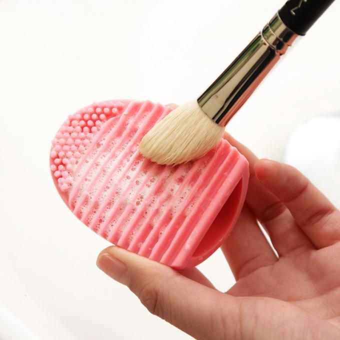 Couleur mauve-clair de maquillage de silicone de beauté de nettoyeur à brosse de forme quotidienne d'oeufs